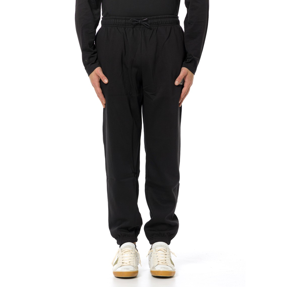 Joggers in pile Mountain Athletics The North Face