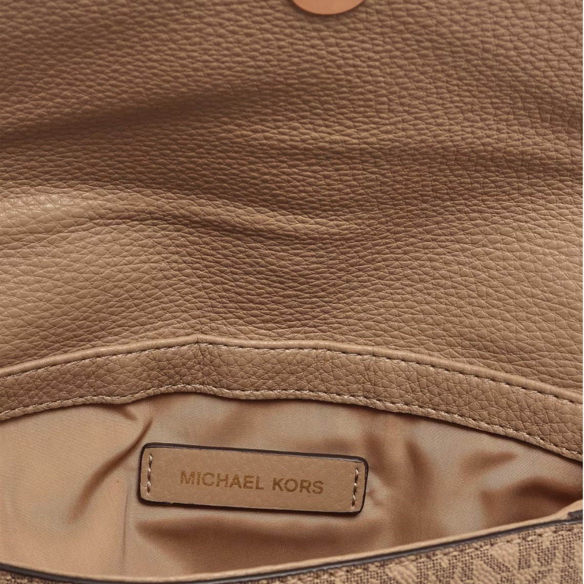 Borsa Michael Kors in cotone spalmato a grana con monogram MK stampato